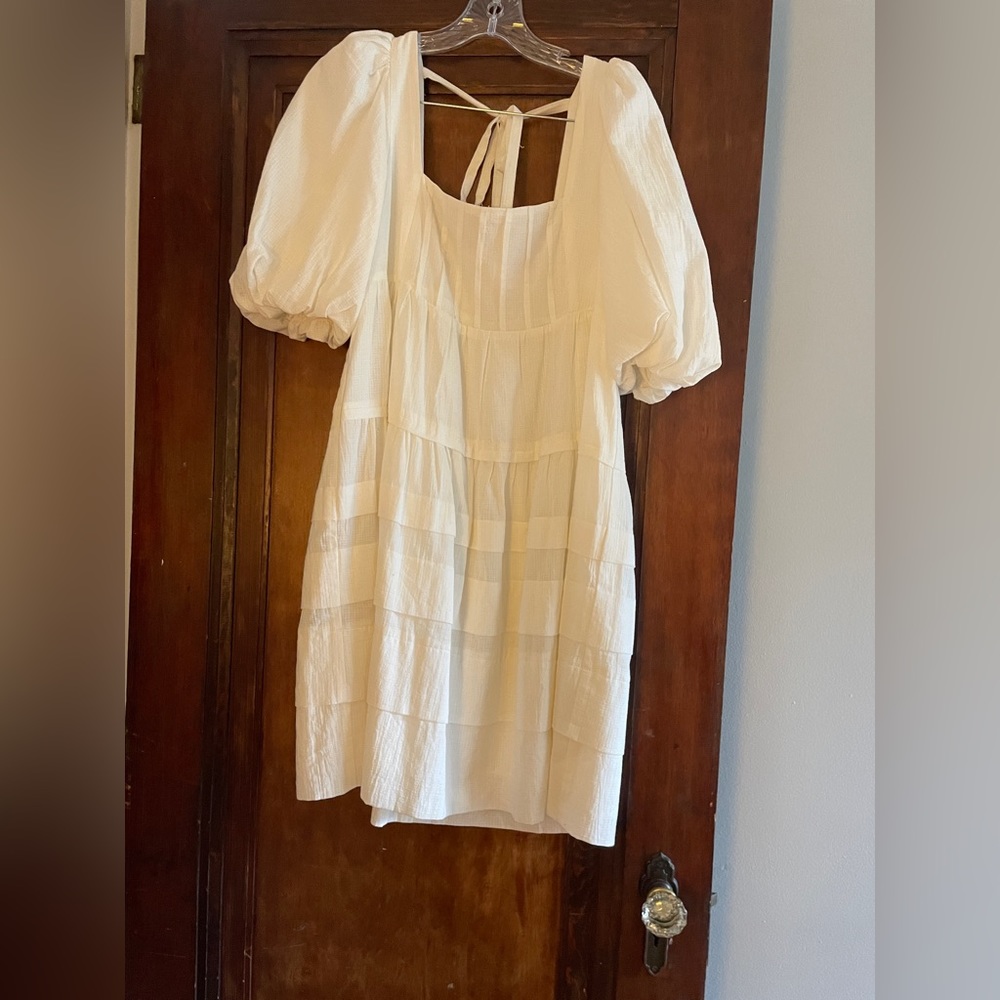 Knee high white dress.